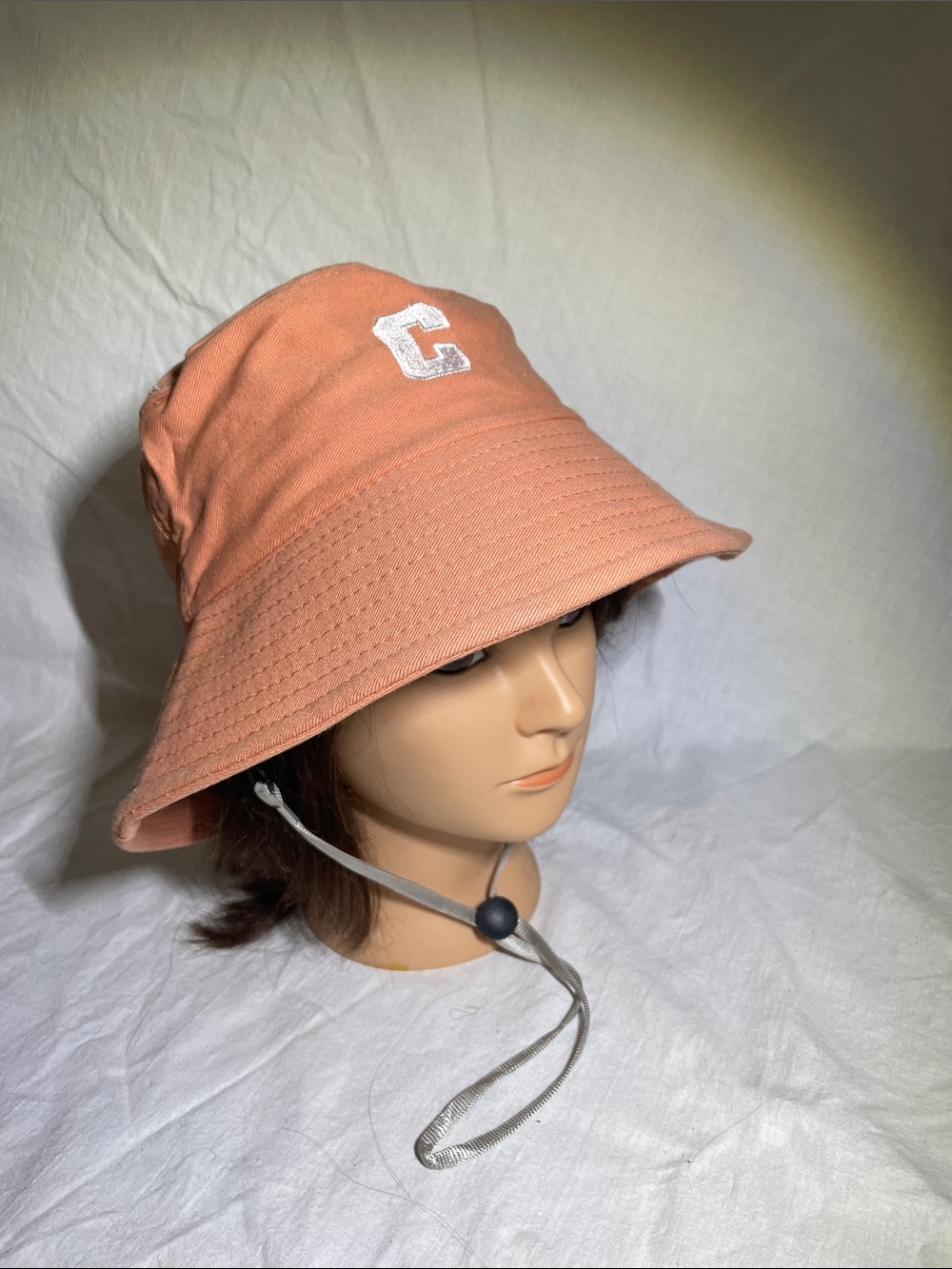 Coral Bucket Hat with 'C' Accent and Adjustable Chin Strap